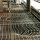 Illustration for article titled This Space-Warping Carpet Is So Awesome It Makes Me Want to Throw Up